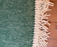 100% Lambswool Herringbone Throw Bottle Green.