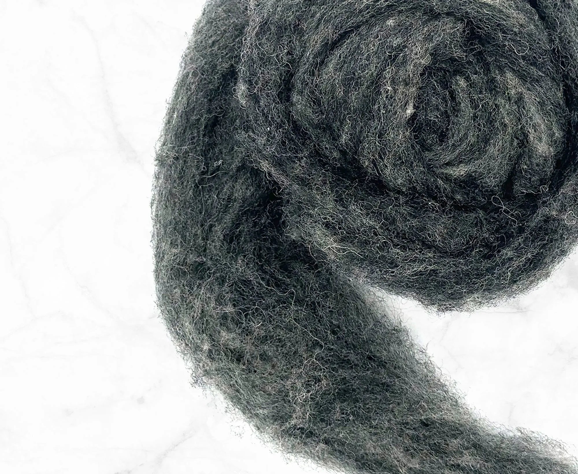 Carded Dark Grey Cheviot Sliver.