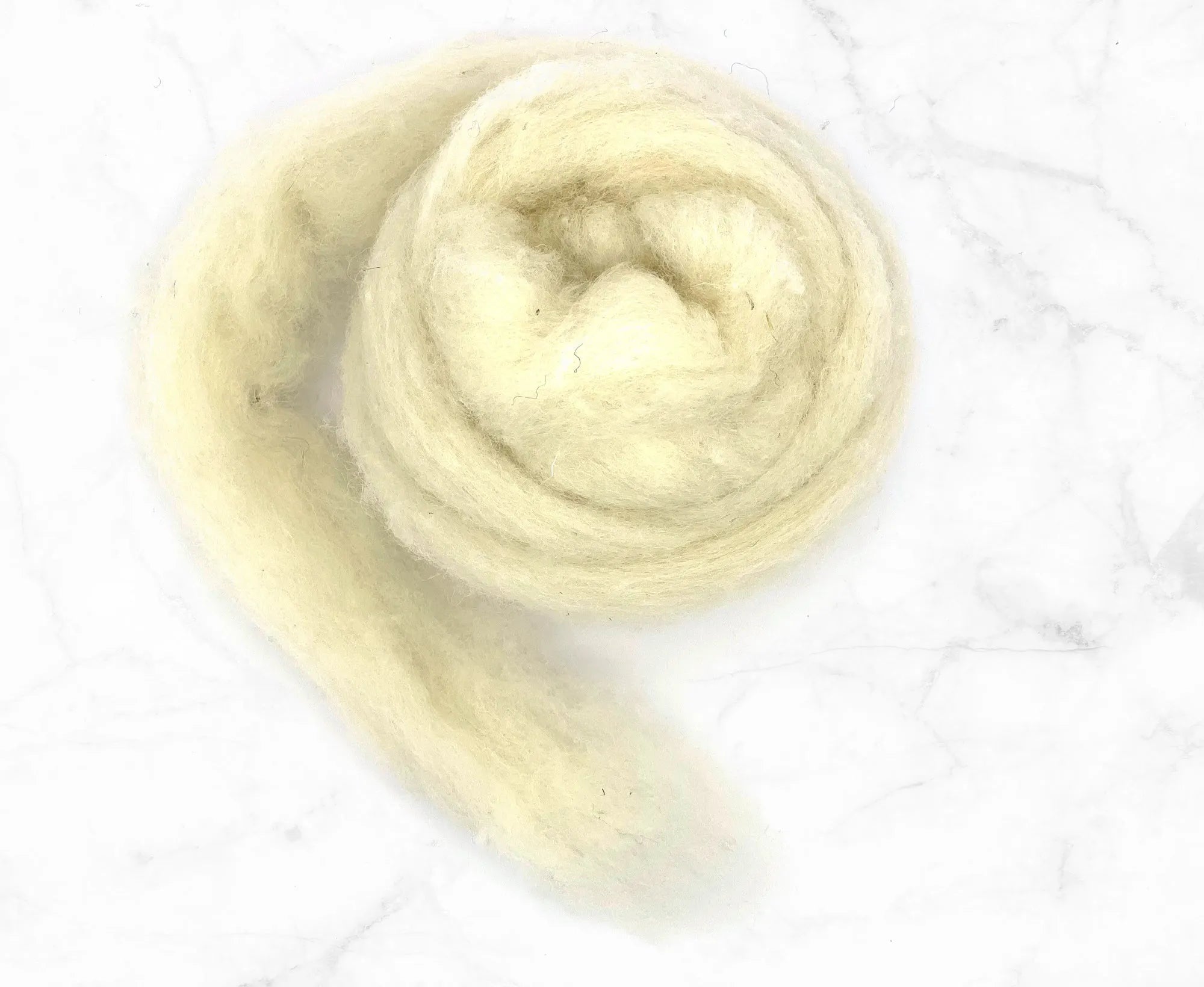 Carded White Norwegian Sliver.