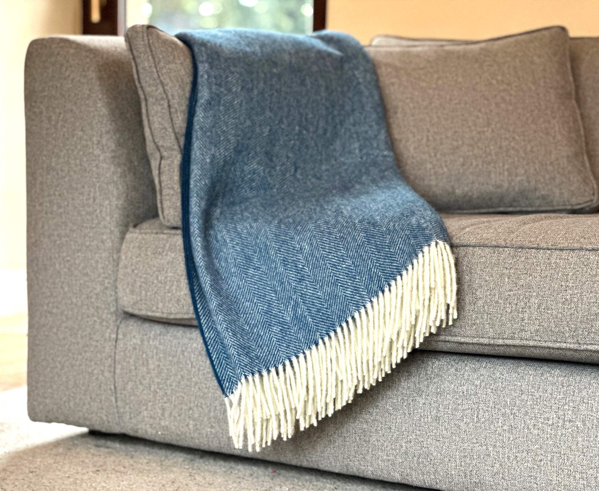 100% Lambswool Herringbone Throw Denim Blue.