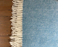 100% Lambswool Herringbone Throw Duck Egg Blue.