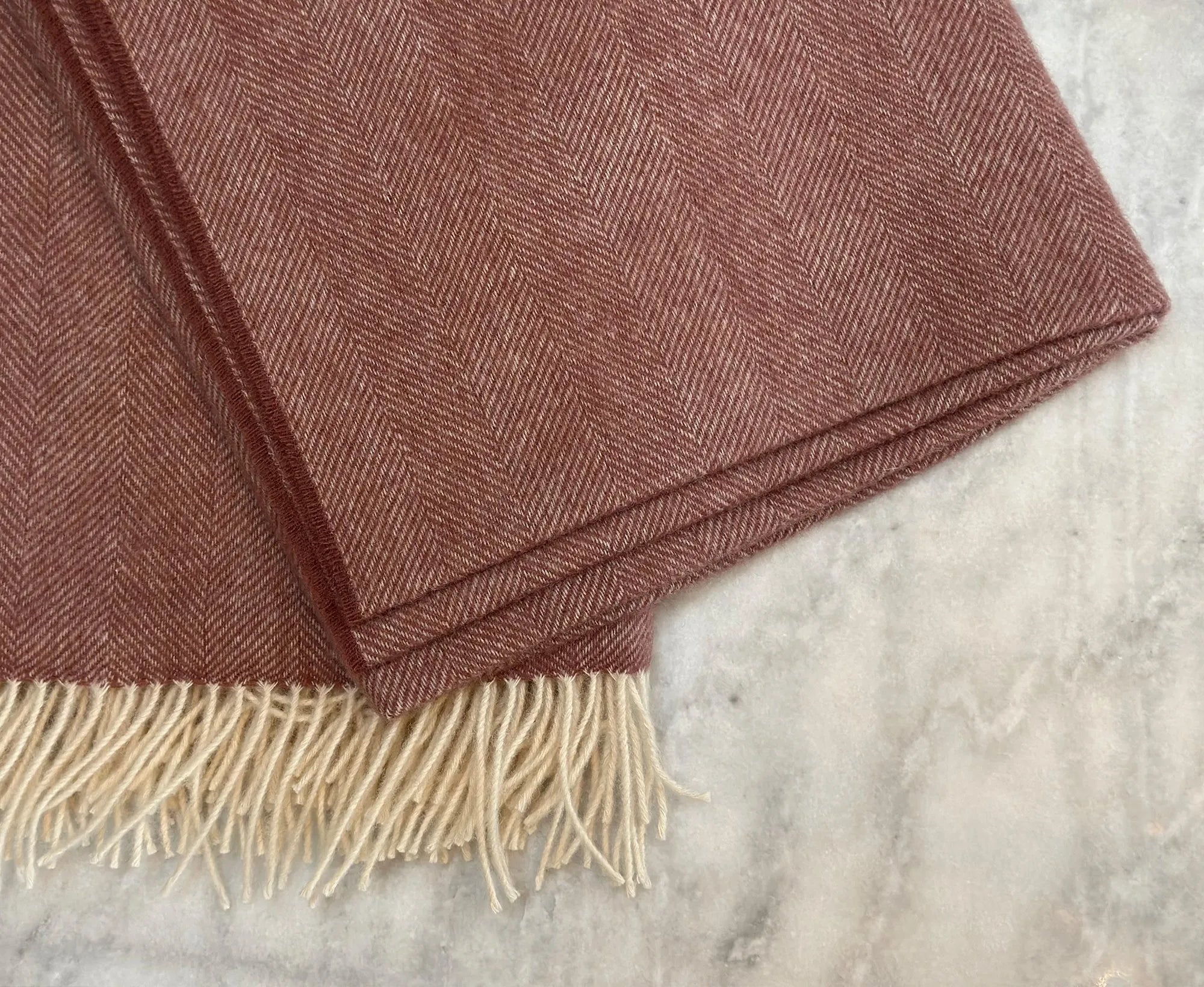 100% Lambswool Herringbone Throw Dusky Pink.
