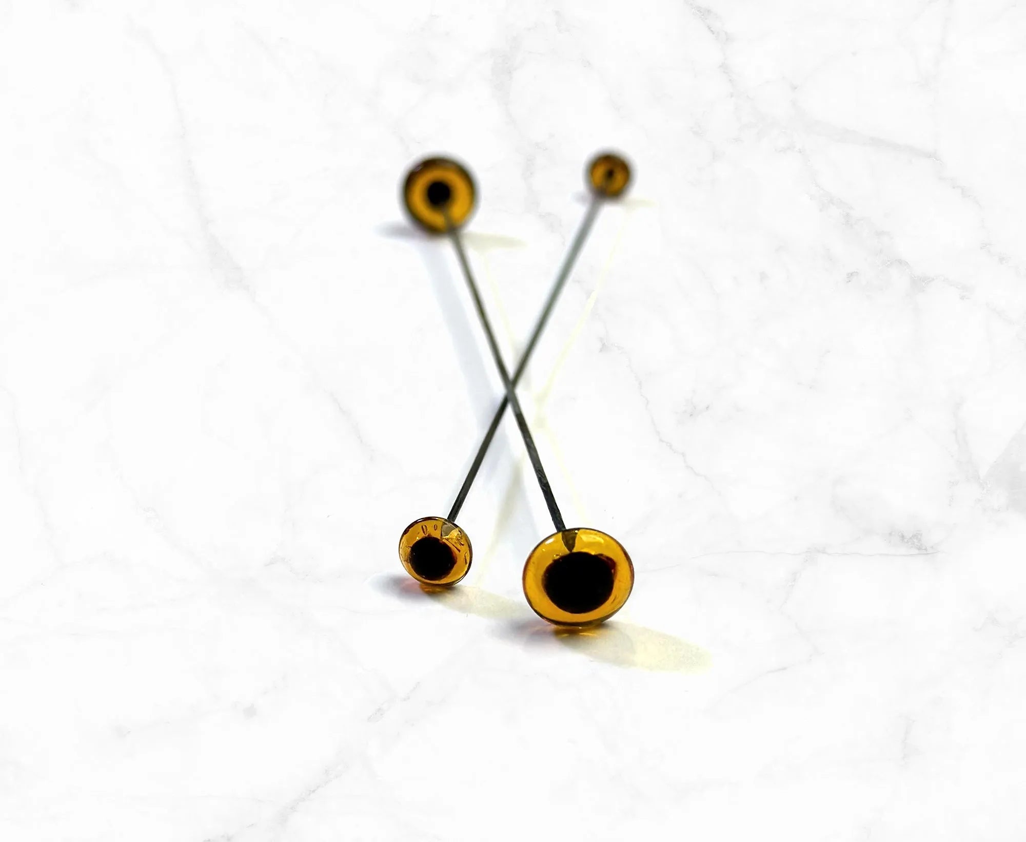 Amber Glass Eyes On Sticks.
