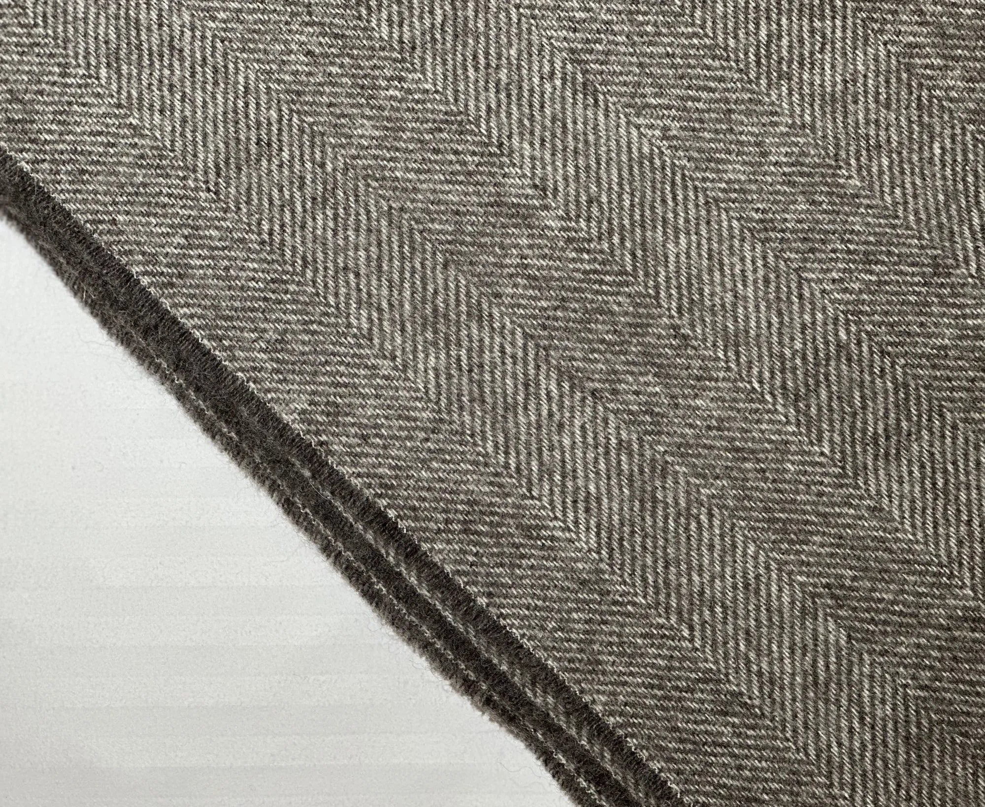 100% Lambswool Herringbone Throw Mid Grey.