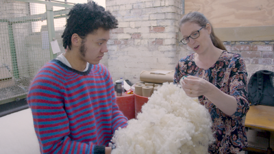 Issac & Lara inspecting the scoured fleece